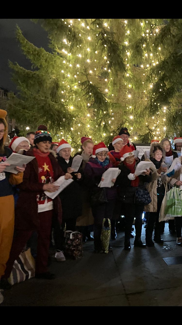 Members of Newham Super Choir plus friends and family singing Christmas Carols in Trafalgar Square in aid of St. Joseph's Hospice.